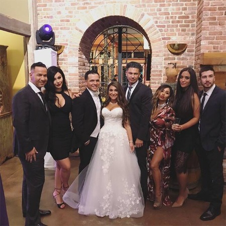Deena Nicole Cortese with Christopher Buckner and with friends and family members at their wedding.